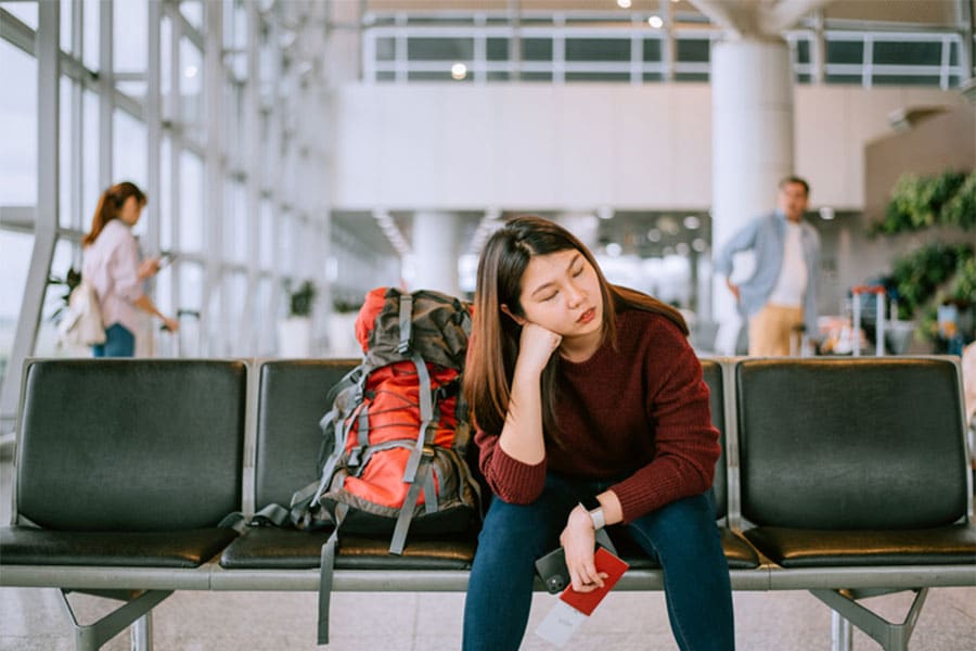 Girl Sitting in Airport