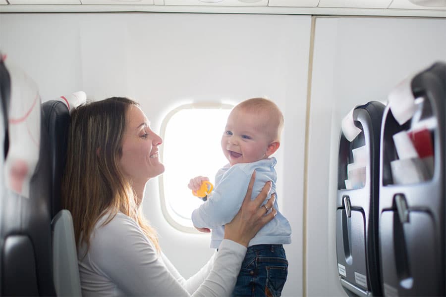 Mom with Baby On Airplane