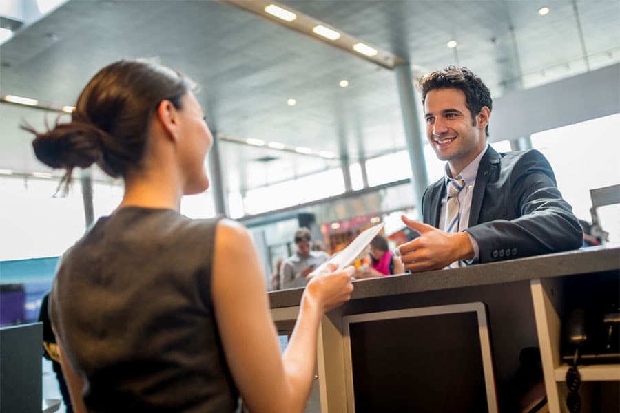 Man Smiling at Airport